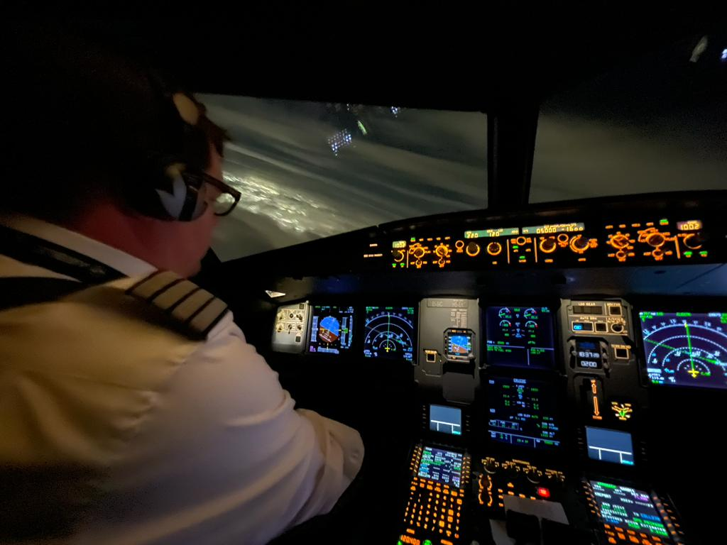 Pilot at the Airbus A320 flight deck controls