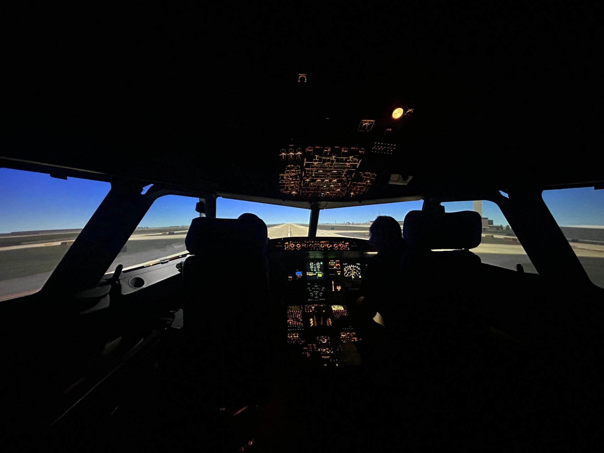 The simulator flight deck on approach in low light
